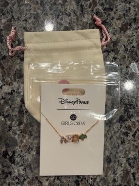 Disney Parks Girls Crew Gold-Tone Necklace with Blue, Pink, and Green Accents